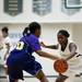Huron freshman Mia Long steals the ball in the game on Monday, Feb. 25. Daniel Brenner I AnnArbor.com